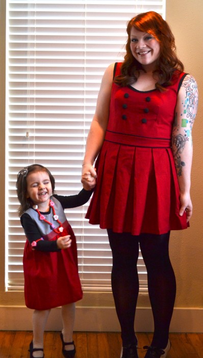 me and my little love bug wearing our Marmalade Forest dresses for Valentine's Day!